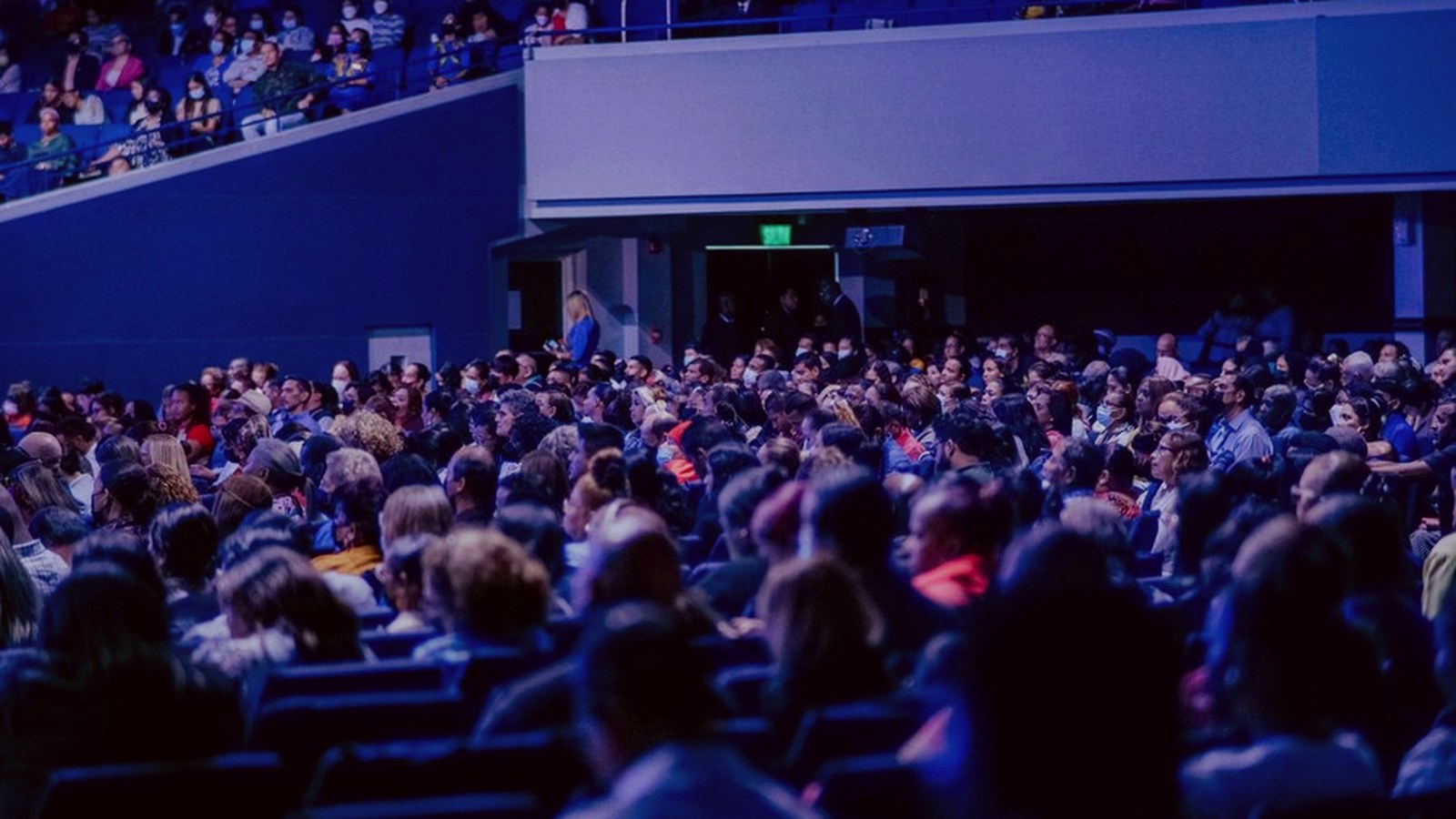 People in a professional event setting